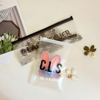 Logo personnalisé réutilisable petit bijoux emballage fermeture éclair sac en plastique mat mignon fermeture éclair sac pour boucle d'oreille PVC mini zip-lock pochette sac