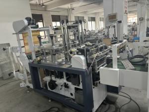 Macchina per la produzione di sacchetti per guanti multifunzione ad alta velocità per imballaggi efficienti - Product Image 5