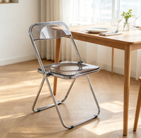 Chaises pliantes transparentes en plastique empilables et résistantes aux intempéries pour événements et fêtes