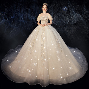 Wedding Dress Off Shoulder Sweetheart Empire Waist Floor Length Tulle Princess Style Plus Size Bridal Gown With Starry Train - Product Image 1
