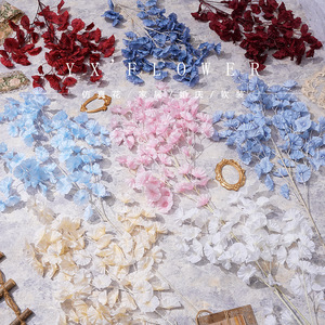 Fleurs artificielles en soie Yixuan à 4 branches Loulan pour décorations de mariage et de maison - Product Image 1