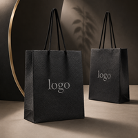 Sac cadeau en papier texturé noir de luxe personnalisé avec poignées en corde pour bijoux, parfums, chaussures et emballages de vente au détail pour boutiques