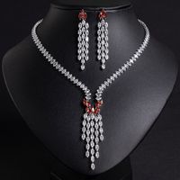 Nouvel ensemble de bijoux de luxe transfrontalier pour femme, boucles d'oreilles et collier en fer avec pampilles goutte d'eau, polyvalent, incrusté de zircon, pour mariée et mariage