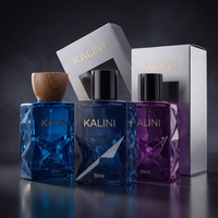 Flacon de parfum de luxe 50 ml vide en verre carré, prêt à l'exportation, avec bouchon doré et design classique, emballage de parfum de niche avec boîte