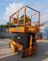 Plateforme élévatrice à ciseaux électrique XCMG GTJZ1212 d'occasion, hauteur de plateforme 12m, capacité 320kg, autopropulsée, pour entrepôt et construction