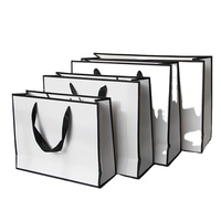 Sac en papier de luxe prêt à l'emploi avec poignée, pelliculage mat et type pliable pour l'emballage de vêtements et de chaussures