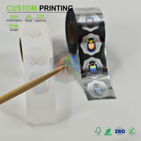 Özel Taraklı Kenarlı Holografik Etiketler Toptan Satış Kalkan Şeklinde Güvenlik Desenli Etiketler Yanardöner Gökkuşağı Parlaklığıyla