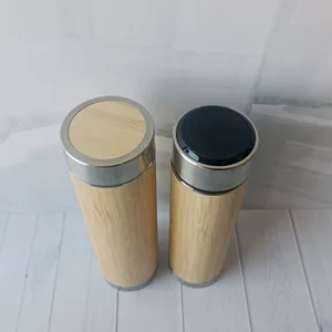 Ingrosso bottiglia d'acqua in acciaio inossidabile Unisex a doppia parete isolata con bottiglia di bambù diretta per bere in metallo
