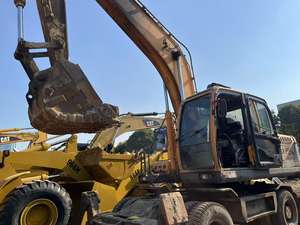 Excavatrice sur pneus Hyundai 210W-9 d'occasion de haute qualité, moteur Cummins, modèle 2015, capacité de la cuve de 1,3 m, composants principaux inclus - Product Image 2