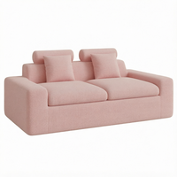 Canapé deux places en tissu chenille rose, rembourré, base chromée, pour salon ou hôtel