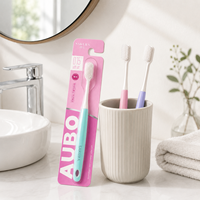 Brosse à dents ergonomique en PP sans BPA avec poils PBT doux de qualité supérieure pour l'hygiène bucco-dentaire à usage quotidien à la maison