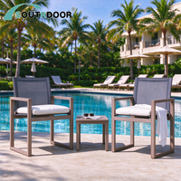Chaise en teck moderne, durable et portable avec ensemble de salle à manger d'extérieur en maille textile et table pour hôtel et jardin