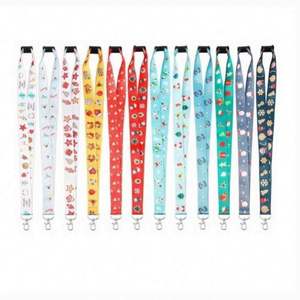 สายคล้องคอคริสต์มาสแบบกำหนดเองพร้อมสายคล้องแบบตะขอ สายคล้องคอโพลีเอสเตอร์พิมพ์ลายซับลิเมชั่นสำหรับคริสต์มาสที่ทนทานพร้อมโลโก้แบบกำหนดเองยอดนิยม จัดส่งด่วน - Product Image 1