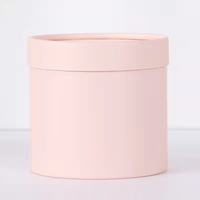 Boîte à fleurs en carton Portable petite conception de cylindre rose blanc pur très populaire pour l'emballage de bouquet gaufrage de revêtement UV
