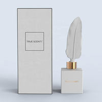 Diffuseur de parfum d'ambiance en verre blanc mat de 150 ml avec plumes en céramique