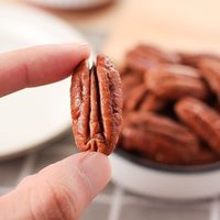 Noix de pécan de qualité supérieure, emballées en vrac, sous vide, séchées en coque et décapsulées pour usage alimentaire