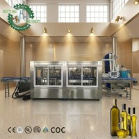 Yüksek Hızlı Cam Yağ Dolum Hattı Throughput-Pro 3000-25000BPH, Yer Fıstığı ve Mısır Yağı Kavanozları için Yıkayıcı, Doldurucu ve Kapaklayıcı