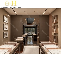 Comptoir de bijouterie au design simple, vitrine murale de luxe personnalisée en verre pour l'aménagement intérieur de bijouterie