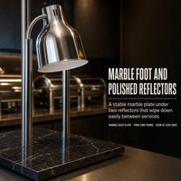 Marmeren voet dubbele kop warmtelamp voor het warmhouden van voedsel in restaurantbuffet en cateringpresentatie.