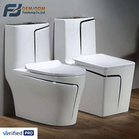 Vasque de toilette monobloc en céramique de luxe moderne, noire et dorée, à poser au sol, avec abattant lent, pour salle de bain de villa