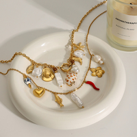 Colliers J&D style océan d'été en acier inoxydable plaqué or 18 carats avec breloques DIY coquillages, céramique, corail, étoiles de mer et perles