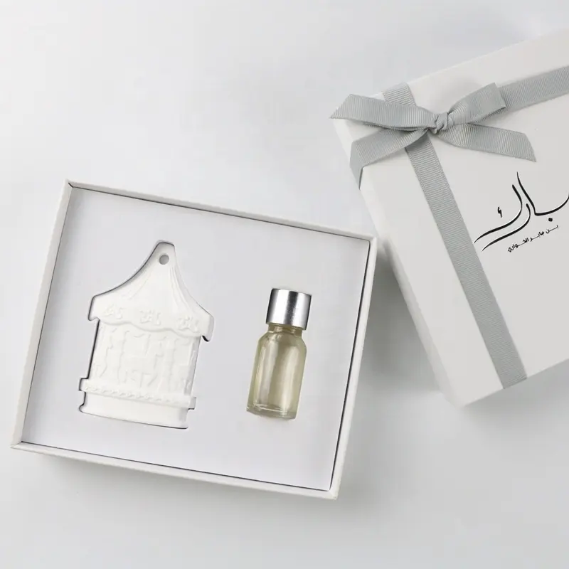 Parfum de luxe personnalisé avec logo imprimé Coffret cadeau Parfum durable Rafraîchisseur d'air portable suspendu Pierre d'argile parfumée en céramique