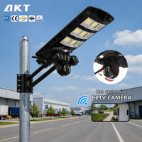 Lampe solaire extérieure à LED IP65 à prix d'usine, couleur réglable, 30W, ABS, haute luminosité, avec caméra CCTV 360°