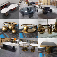 Salon italien de luxe moderne Table basse de thé centrale en acier inoxydable marbre métal noir doré avec pieds boule