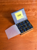 Boîtes cadeaux rigides en carton ondulé de luxe, best-sellers 2025, fermeture magnétique, revêtement UV, gaufrage pour chocolat Themra Macun