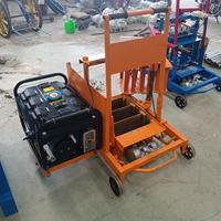 Machine de fabrication de briques creuses mobile centrale à vibration manuelle Condition utilisée pour le béton, le ciment Caractéristique brute Creux