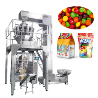 Machine de remplissage automatique pour pesée de bonbons, de thé, de noix, de casse-croûte Machine d'emballage verticale de sachets de biscuits à soufflet