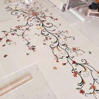 Médaillon en marbre jet d'eau de luxe motif fleurs escalier carrelage design médaillon de sol en marbre beige incrustation médaillon de sol