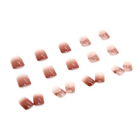 Faux ongles à presser, forme amande, longueur moyenne, motif ombré rose-brun scintillant, pour application sur les doigts