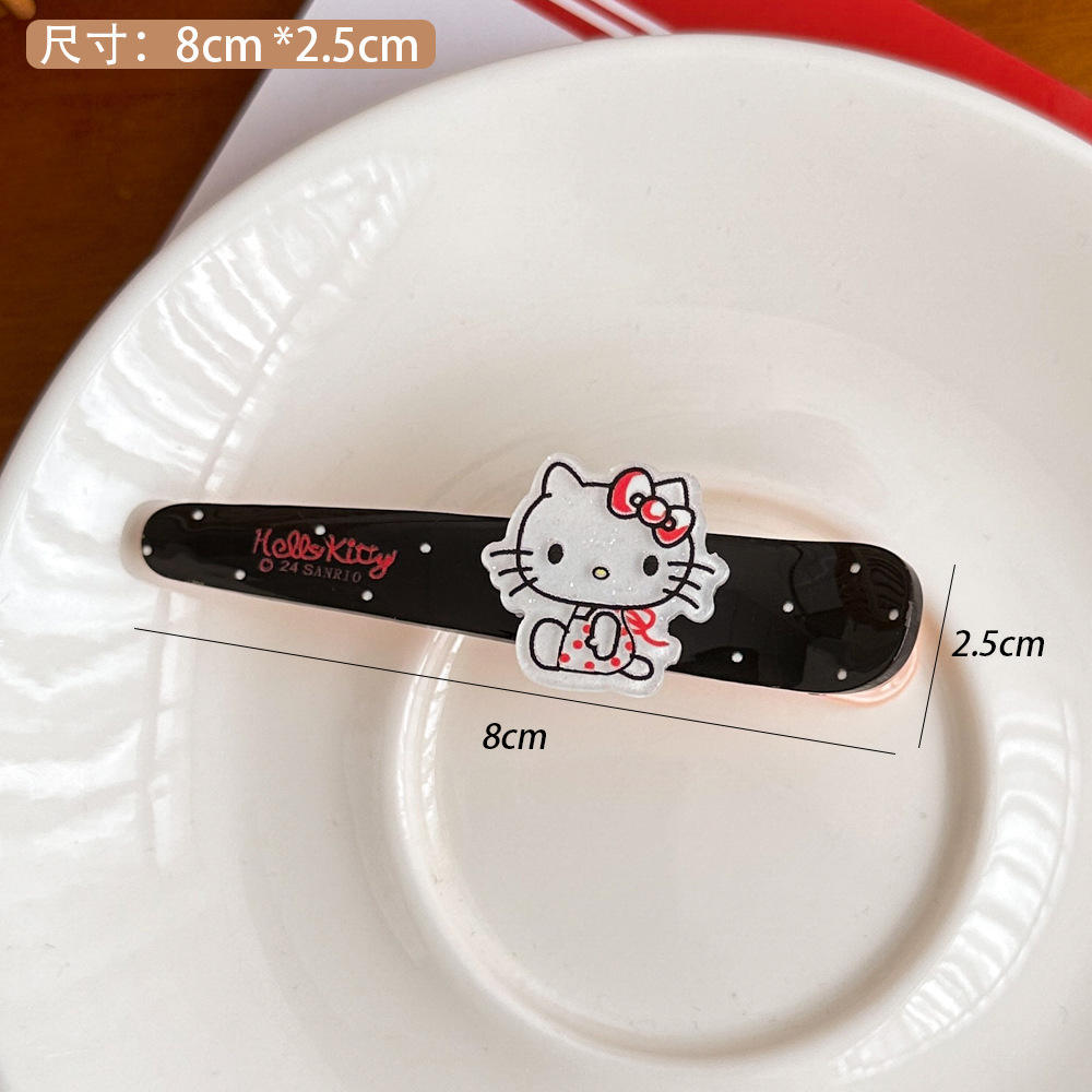 Black kt polka dot hair clip