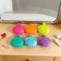 Porte-monnaie en silicone, petit sac, rangement pour cosmétiques et bijoux, étui pour câbles d'écouteurs, auto-chauffant