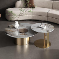 Table basse de salon moderne de luxe léger, design créatif, plateau en marbre, simple, ronde, en acier inoxydable doré