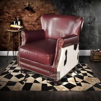 Fauteuil en cuir de vachette noir et blanc de style européen, cuir véritable, structure en bois massif, fauteuil luxueux à une place, mobilier d'intérieur, chaise confortable