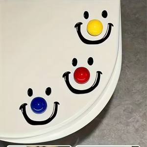Lève-couvercle de toilettes écologique de style contemporain en ABS avec film UV, en forme de boule souriante, pour salle de bain - Product Image 1