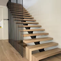 Escalier flottant moderne en bois avec poutre en acier |   Conception personnalisée d'escaliers intérieurs