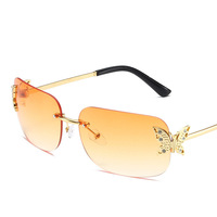 Lunettes de soleil de luxe pour hommes et femmes, design rectangulaire tendance avec tête de léopard, monture transparente/rouge en métal, protection UV400 pour la conduite