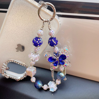 Breloque de téléphone papillon bleu en strass et perles, pendentif de sac artisanal lourd, cordon de poignet, cadeau bijoux pour femme