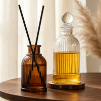 Bouteille diffuseur de parfum en verre côtelé de luxe avec bouchon sphérique rond 100ml 200ml – Bouteilles d'huile parfumée transparentes cannelées en gros