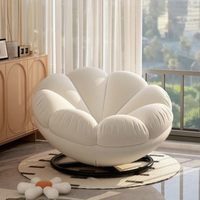 Fauteuil gris de style nordique, élégant, en forme de pétale, pivotant, avec coussin en peluche doux, pour la décoration moderne de la maison et du salon.