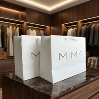 Sac fourre-tout en papier de qualité supérieure sur mesure, sac cadeau gousseté avec logo en relief pour boutique de vêtements et magasin de détail