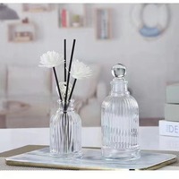 Bouteille en verre sérigraphiée rayée 50 ml avec joint en caoutchouc rond pour cosmétiques, huiles essentielles, parfums – Vente en gros directe usine