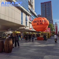 Ballon à air chaud gonflable orange pour publicité et décoration avec logo imprimé, ballon à air chaud gonflable pour événements extérieurs