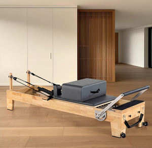 Equipo de Pilates Reformer de Roble de Lujo de Alta Gama para Uso Doméstico con Cuerdas Personalizadas OEM y Juego de Muelles de Retracción Automática para Ejercicio de Yoga y Fortalecimiento del Core - Product Image 1