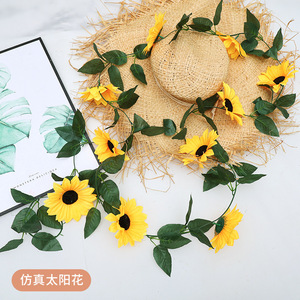 Guirnaldas de girasoles artificiales Xinchengzhi, 10, 17, 45 cabezas, tira de flores decorativas para decoración de paredes interiores - Product Image 1