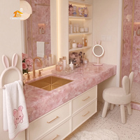 Comptoir de coiffeuse de luxe en pierre de quartz rose cristallin pour dressing