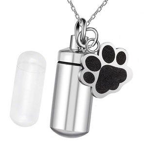 Collana con ciondolo urna commemorativa per animali domestici in acciaio inossidabile moderno, con impronta di zampa, a forma di cilindro, per profumo, articoli funerari per la famiglia - Vendita calda - Product Image 1